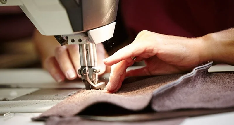 skilled-chesterfield-sofa-sewing